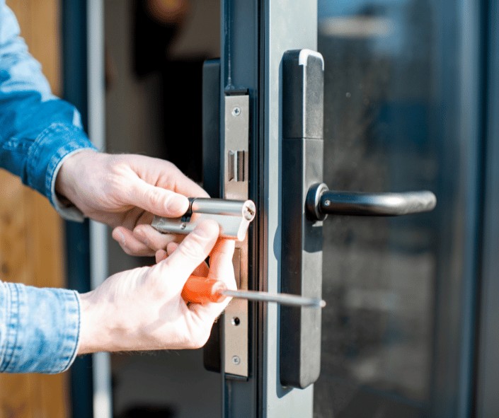 Replacing lock to an exterior door during an emergency locksmith service by BS Locksmith