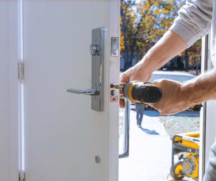 Front Door Locksmith Service changing locks.<br />
Emergency Locksmith Service - Aurora, Colorado - BS Locksmith